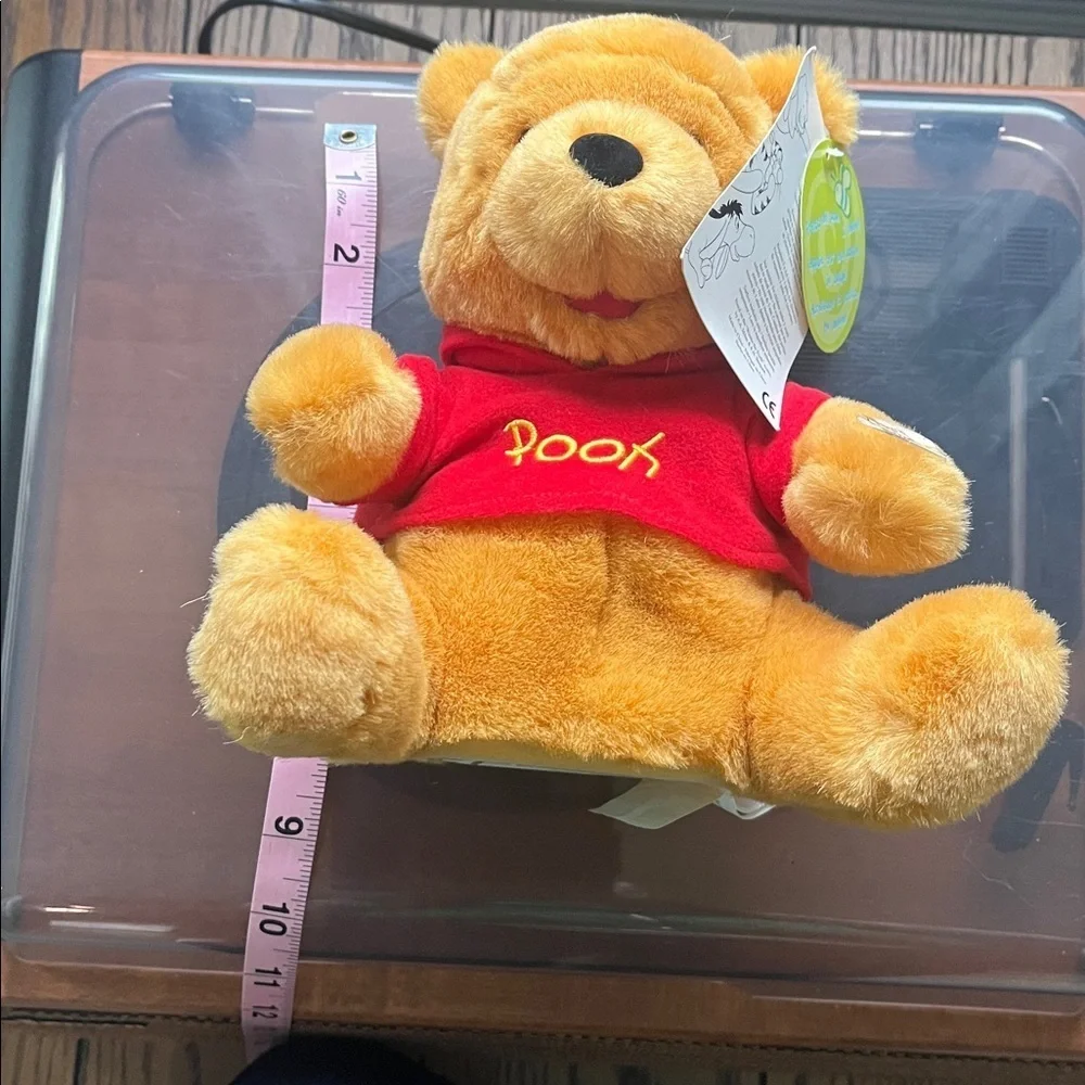Winnie the Pooh plays song and moves!Charming Yellow and Red Stuffed Bear